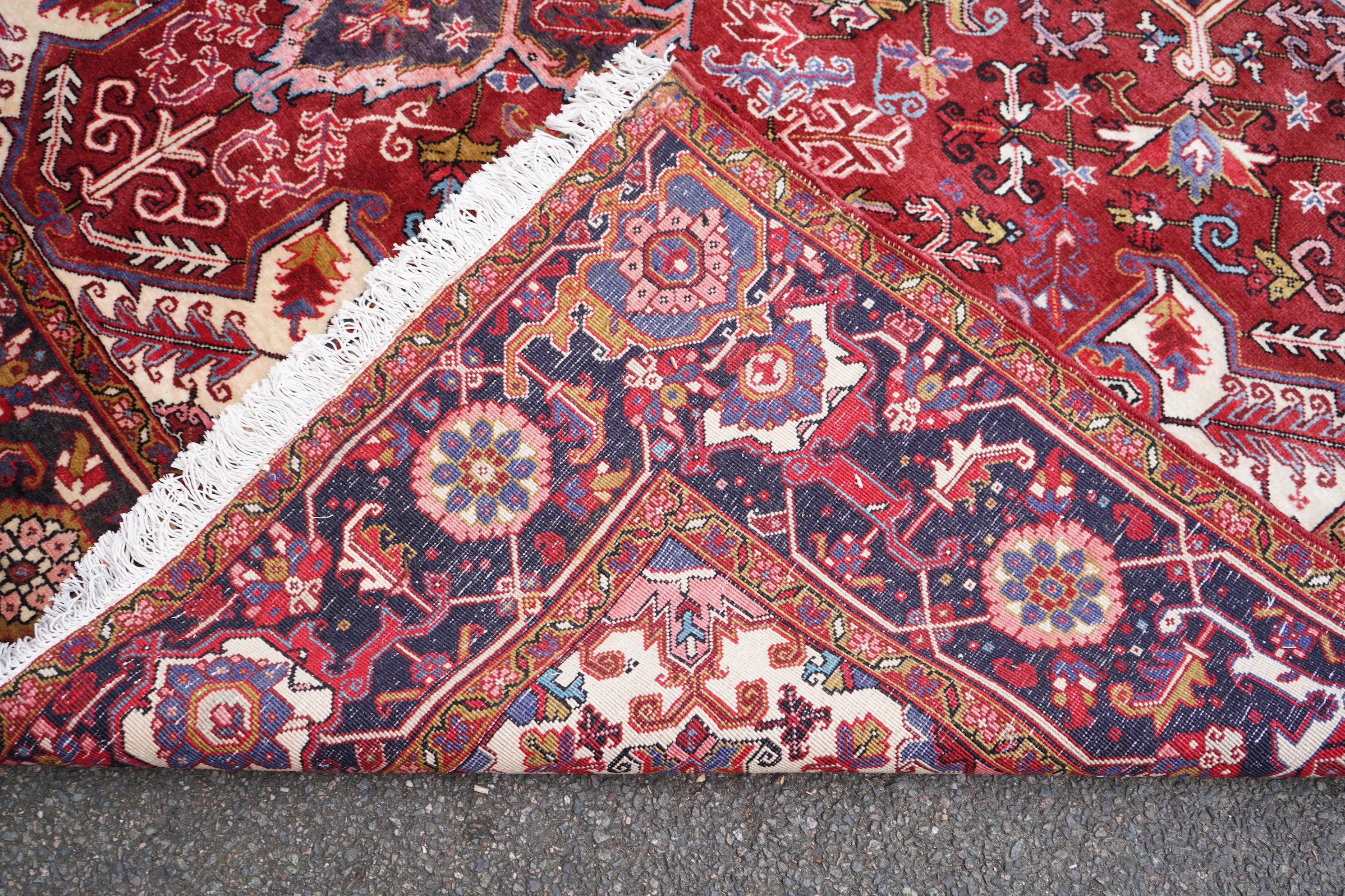 A Heriz red ground carpet